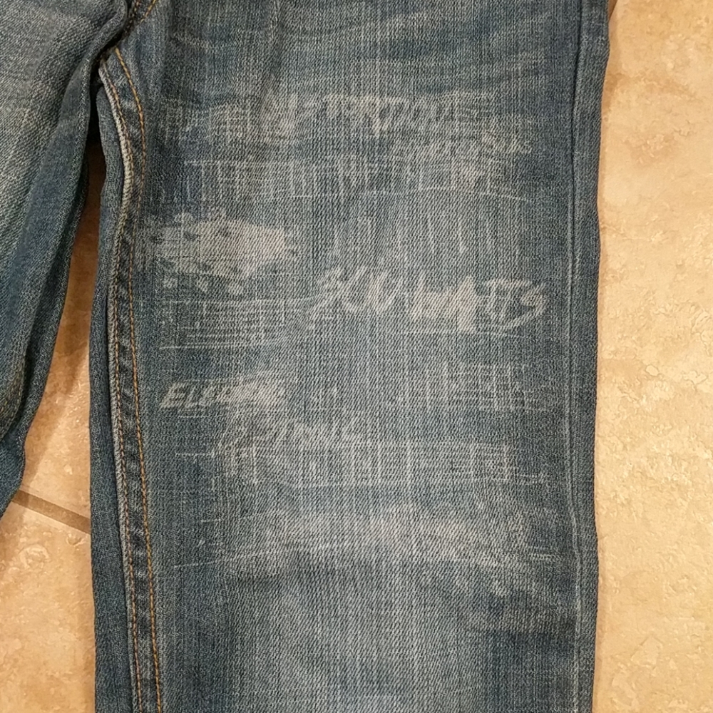 Guitar rock bleached denim jeans